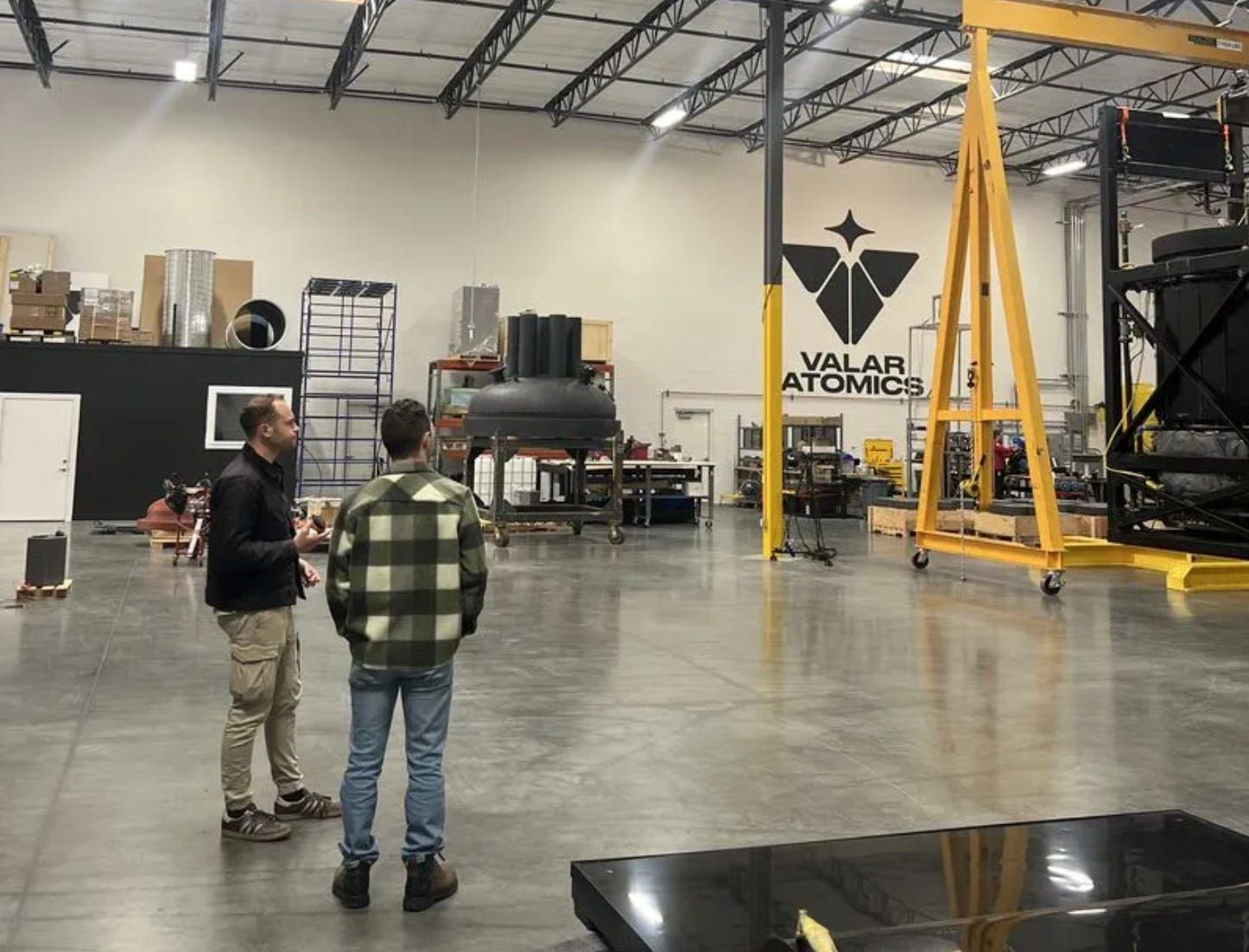 Standing by the reactor with Isaiah at Valar Atomics