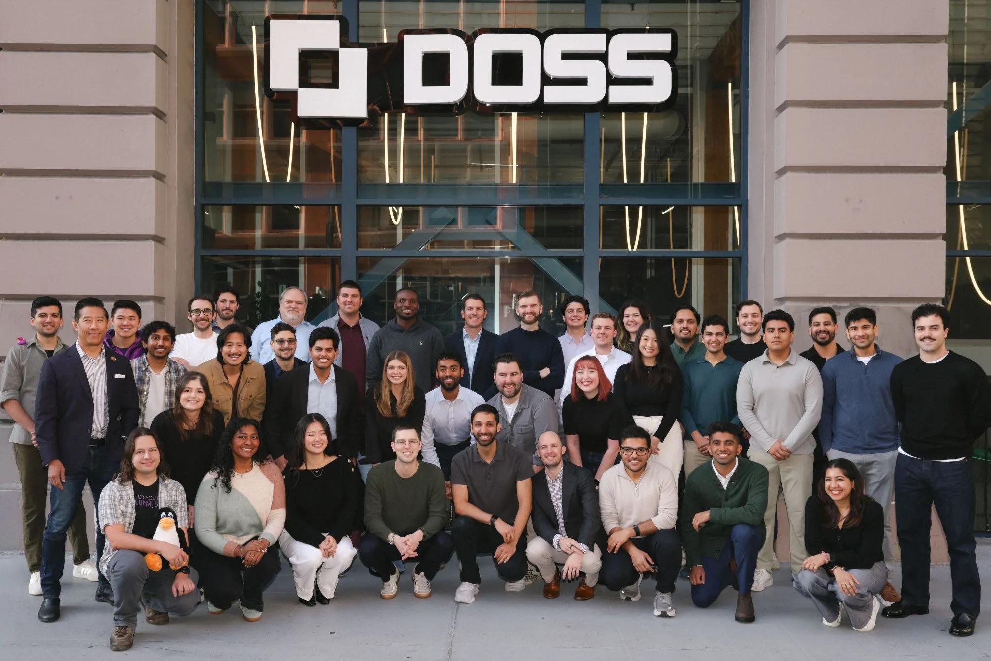 The DOSS team outside the DOSS office